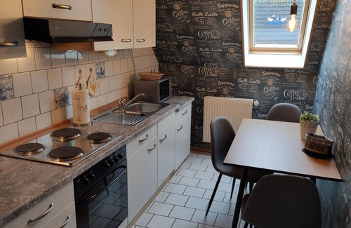Dornumergrode Apartment | Gästehaus Zur alten Post - Wohnung West