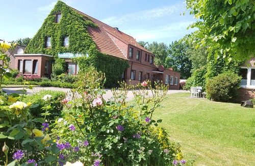 Dornumergrode Apartment | Gästehaus Zur alten Post - Wohnung West