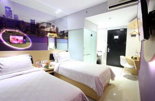 Gubeng Hotel | G Suites Hotel by AMITHYA