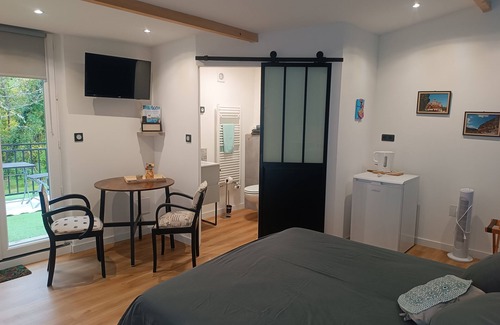 Journiac Bed & Breakfast | Garden side, guest room and private terrace with wooded view
