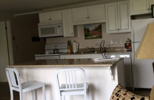 Westfield Apartment | Garden View- Perfect Getaway, Private Unit. Wifi, Patio, Smart TV, AC.