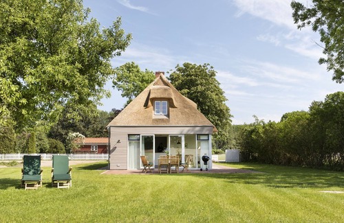 Holzdorf House | Gem under thatch with stove and sauna