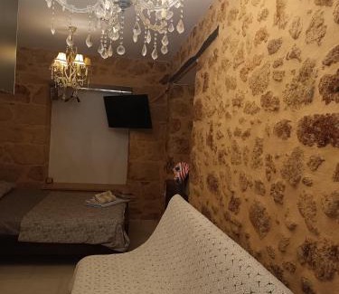 Filiatra Apartment | Georgia Kafira stone and marble traditional house