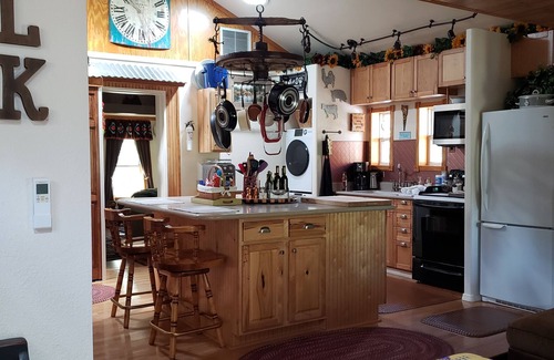 Tijeras House | Get away to the cool mountains and relax at the Cuddle Cottage! Double occupancy