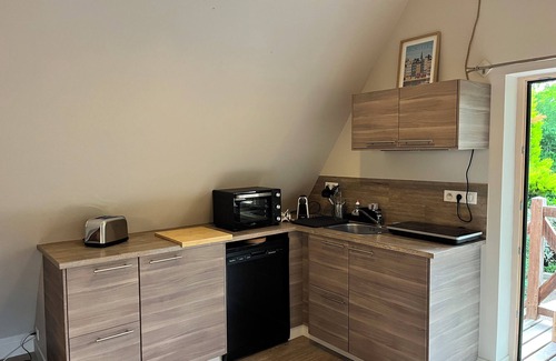 Saint-Gatien-des-Bois Apartment | Gite for 2 people with access to 2000M2 garden, deckchairs, garden furniture