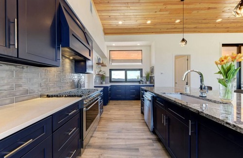 Concan House | Glam Luxury Home by Frio River! Infinity Pool Firepit Games Huge Hot Tub Views