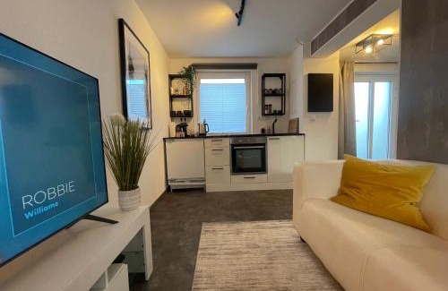 Bueckeburg Apartment | Gleis 12 , kontaktloser 24-7-Check In, barrierefrei ,Smart TV, W-LAN, Parkplatz kostenlos