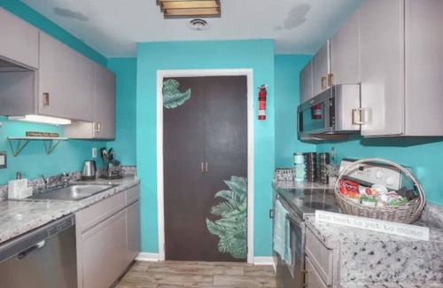Caine Woods Condo | Good Vibes Only:Peace, Pool & Beach-2BR/2B Retreat