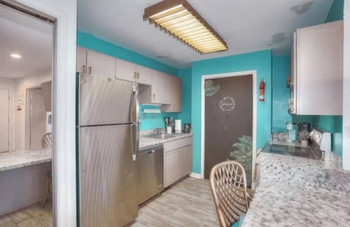 Caine Woods Condo | Good Vibes Only:Peace, Pool & Beach-2BR/2B Retreat