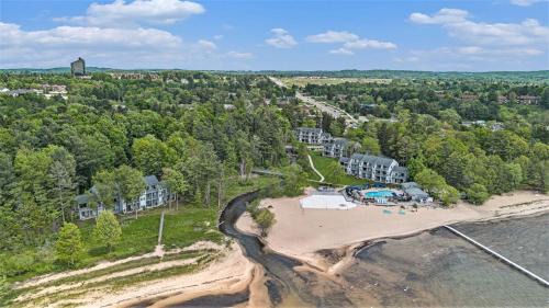 Acme Apartment | Gorgeous Grand Traverse Bay Beach Front Condo