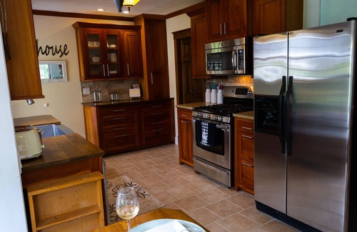 Cabool House | Gorgeous home outdoor covered bar & minutes from floats, cliffs, tubing