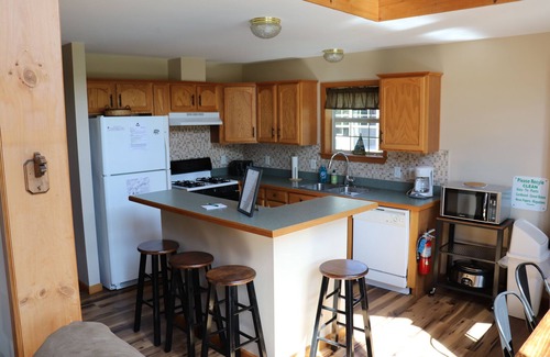 Inlet House | Gorgeous view of the lake from private deck.