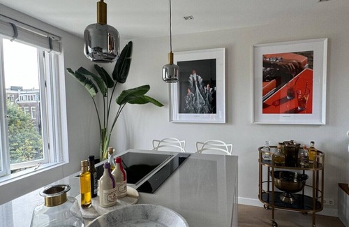 Weesperzijde Condo | Grand Amstel Residence | Expansive Two-Story Riverfront Apartment in Central Amsterdam