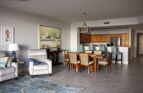Burnt Store Marina Condo | GRAND ISLES III, 5th Floor Condo w/an AMAZING SUNSET VIEW in a Tropical Setting