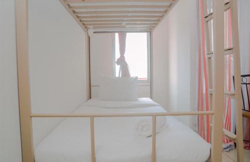 Pluit Apartment | Green Bay Pluit Studio Apartment with 2 Single Beds By Travelio