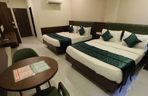 Adajan House | GreenOtel Room Surat