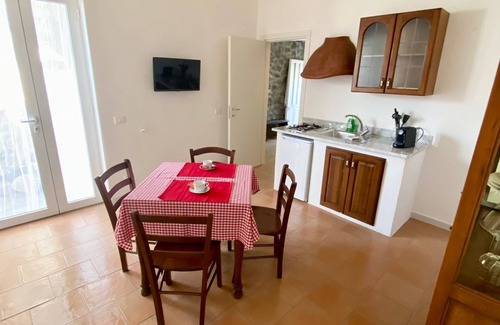 Panza Apartment | "Greta's cottage," with garden, swimming pool and spa hot tub