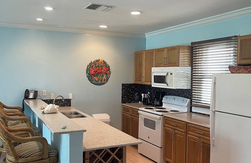 Wheeland Settlement Condo | Ground floor 3 bedroom pool, hot tub private beach wifi sleeps 6