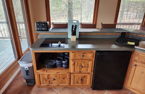 Amherst Cottage | Guest house on secluded 120 acre property minutes from Chain 0' Lakes