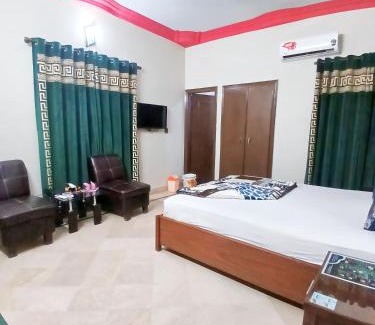 Gulshan-e-Iqbal Hotel | GULSHAN PALACE Near Agha Khan Hospital Expo Center Airport