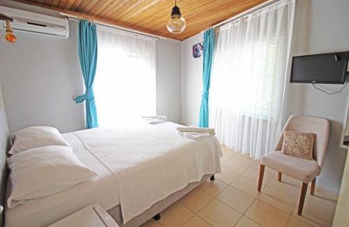 Bozcaada Hotel | Hambarlı Otel