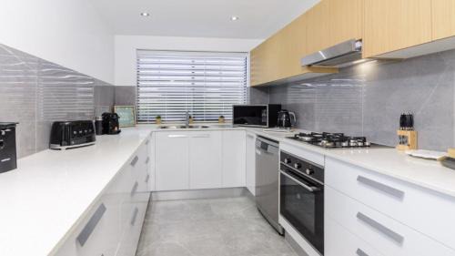 Sandstone Point House | Harbourside Retreat
