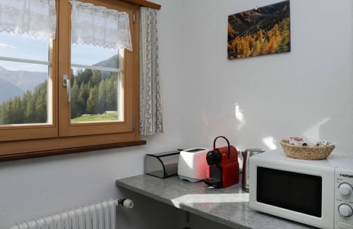 Frauenkirch Apartment | Haus Chumma Apt1 by Interhome