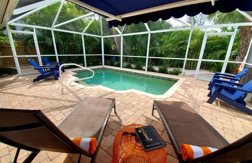 Englewood House | Heated Pool, Bikes, Kayaks, Sups, Outdoor Tiki Bar with TV! & Corn Hole Court