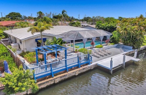 Coral Ridge Isles Villa | Heated Pool~Waterfront 4BD Villa~Deck~BBQ