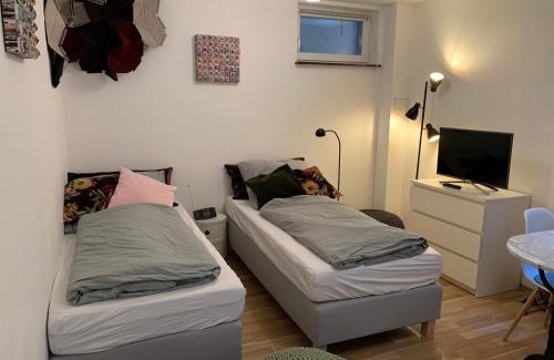 Munchen District Apartment | Helle Souterrainwohnung mit Komfort