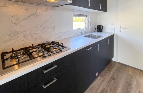 Heusden Gem Asten House | Here awaits you a high quality modern peacefully located vacation home in the North Brabant region.