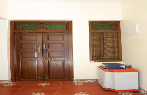 Madurai House | Heritage home with 3 bed/3 bath with kitchen in a residential neighborhood.