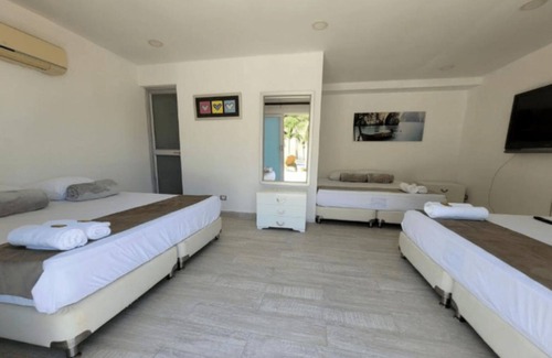 Taganga Hotel | Hermosa Habitacion Estandar Familiar En Playas De Taganga