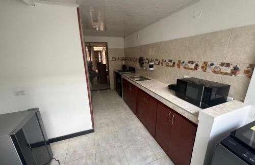 Calle 26 Apartment | Hermoso apartamento cerca al aeropuerto!