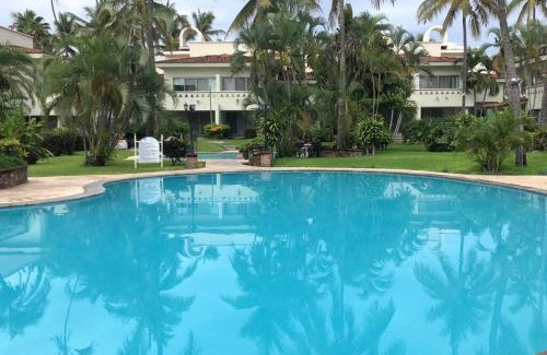 Olas Altas Apartment | Hermoso apartamento en Manzanillo con alberca y cancha de tenis, Ideal para relajarse y disfrutar de una escapada tranquila en el paraíso tropical