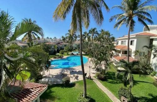 Olas Altas Apartment | Hermoso apartamento en Manzanillo con alberca y cancha de tenis, Ideal para relajarse y disfrutar de una escapada tranquila en el paraíso tropical