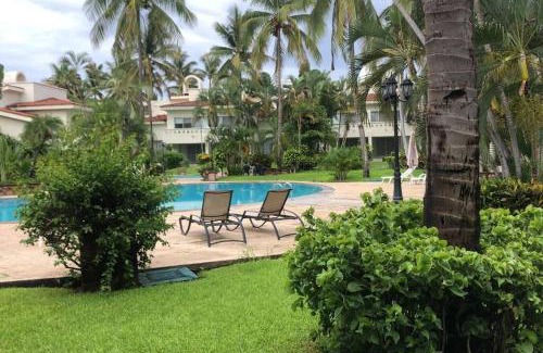 Olas Altas Apartment | Hermoso apartamento en Manzanillo con alberca y cancha de tenis, Ideal para relajarse y disfrutar de una escapada tranquila en el paraíso tropical