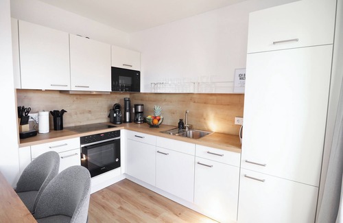 Tossens Apartment | HimmelFrei - Water view. Sauna. Two roof terraces. Dog welcome
