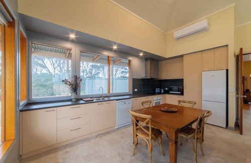 Macgillivray Cottage | Historic and Charming Cottage with Modern Comfort and Two King Suites