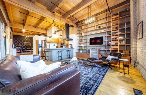 Downtown Edmonton Apartment | Historic JD Loft, Near ICE District, Rogers Place, UG Parking