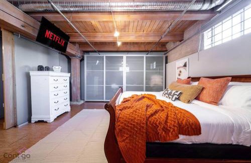 Downtown Edmonton Apartment | Historic JD Loft, Near ICE District, Rogers Place, UG Parking