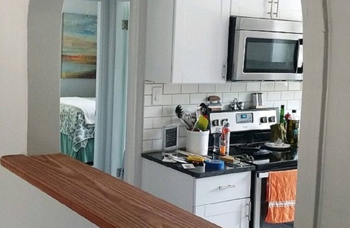 Nob Hill House | Historic Nob Hill home with cozy covered deck and close to Route 66.