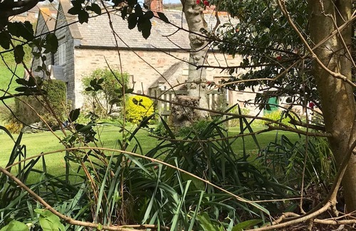 Lee Cottage | Historical Chapel Cottage. Professional Tennis Court, sea views, 2 mins to beach