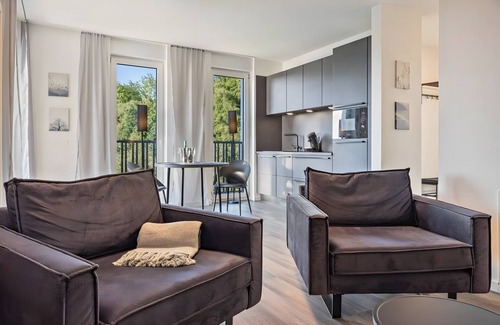 Altenbeken Apartment | Holiday Apartment "Egge Resort 7d" with Balcony, Whirlpool and Sauna with Viaduct View