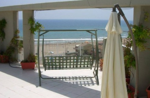 Puig Apartment | Holiday Apartment 'Moderno Atico Dúplex' near the Sea with Shared Pool, Terrace & Wi-Fi