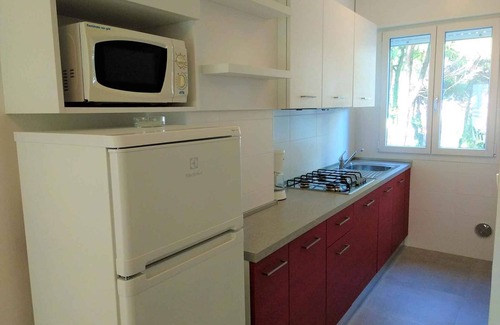 Lignano Sabbiadoro Apartment | Holiday apartment with balcony and air conditioning