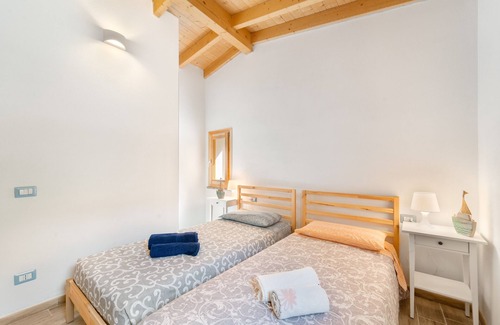 Buggerru House | Holiday Home 'Blanca' with Mountain View, Private Terrace and Air Conditioning