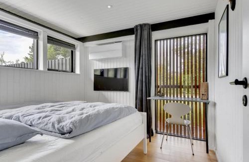 Holloselund House | Holiday Home Hævnir - 1km from the sea by Interhome