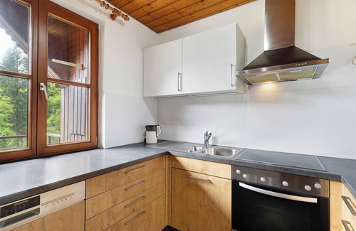 Schenkenzell House | Holiday Home 'Haus 2 Hanselishof - 2 Wohnungen' with Mountain View, Shared Garden and Wi-Fi