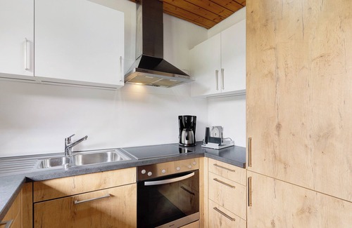 Schenkenzell House | Holiday Home 'Haus 2 Hanselishof - 2 Wohnungen' with Mountain View, Shared Garden and Wi-Fi